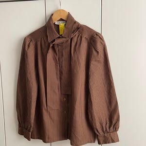 Vintage button blouse with matching tie.
